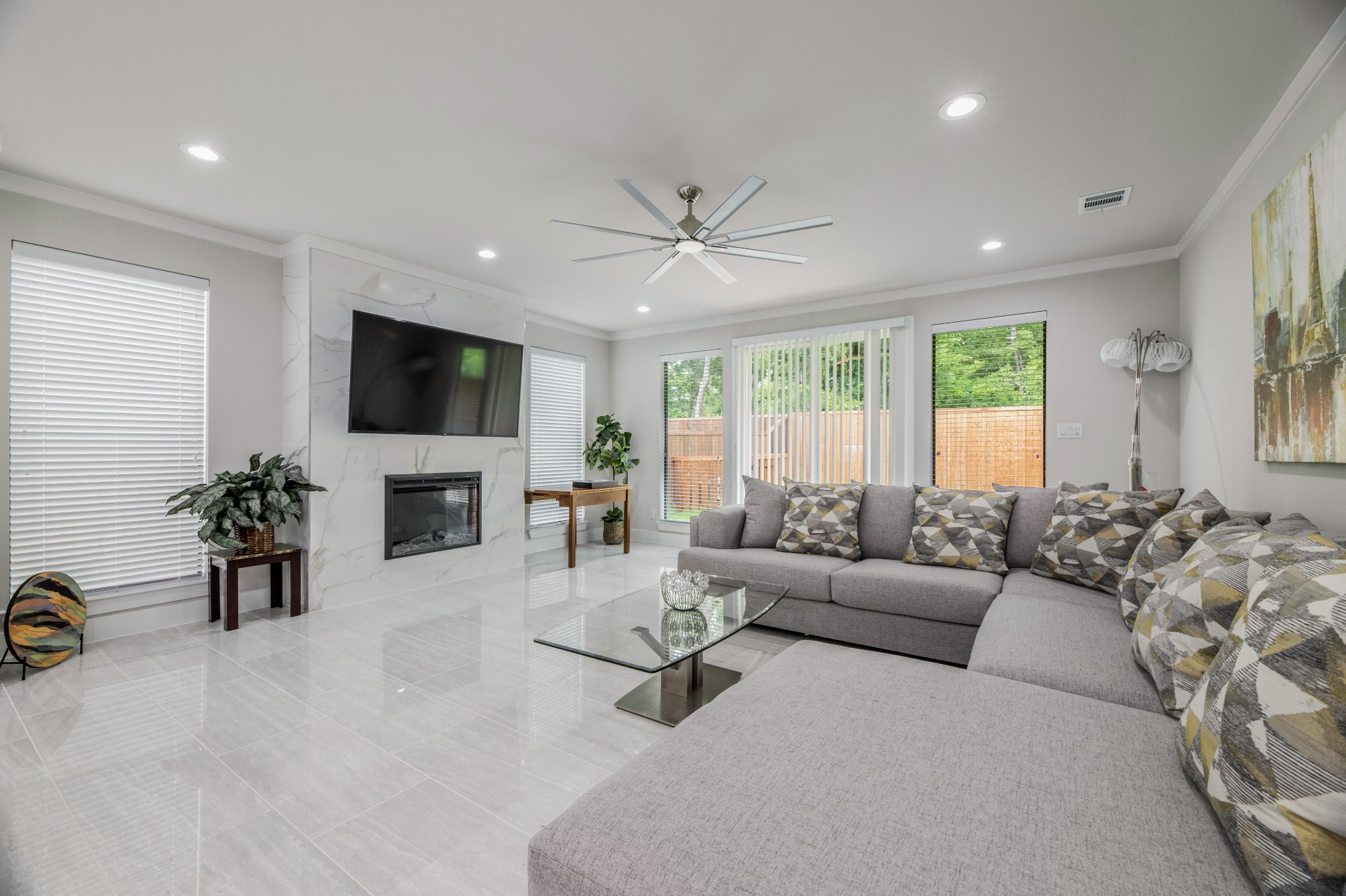 Elegant living room with marble fireplace — HostStarter managed